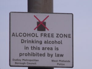 "Alcohol Free Zone - Drinking alcohol in this area is prohibited by law - sign on Trindle Road, Dudley" by ell brown is licensed under CC BY 2.0.
