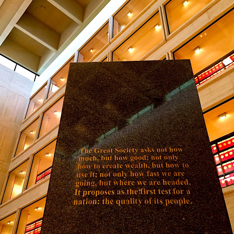 Granite pillar engraved with the quote, "The Great Society asks not how much, but how good; not only how to create wealth, but how to use it; not only how fast we are going, but where we are headed. It proposes as the first test for a nation: the quality of its people."