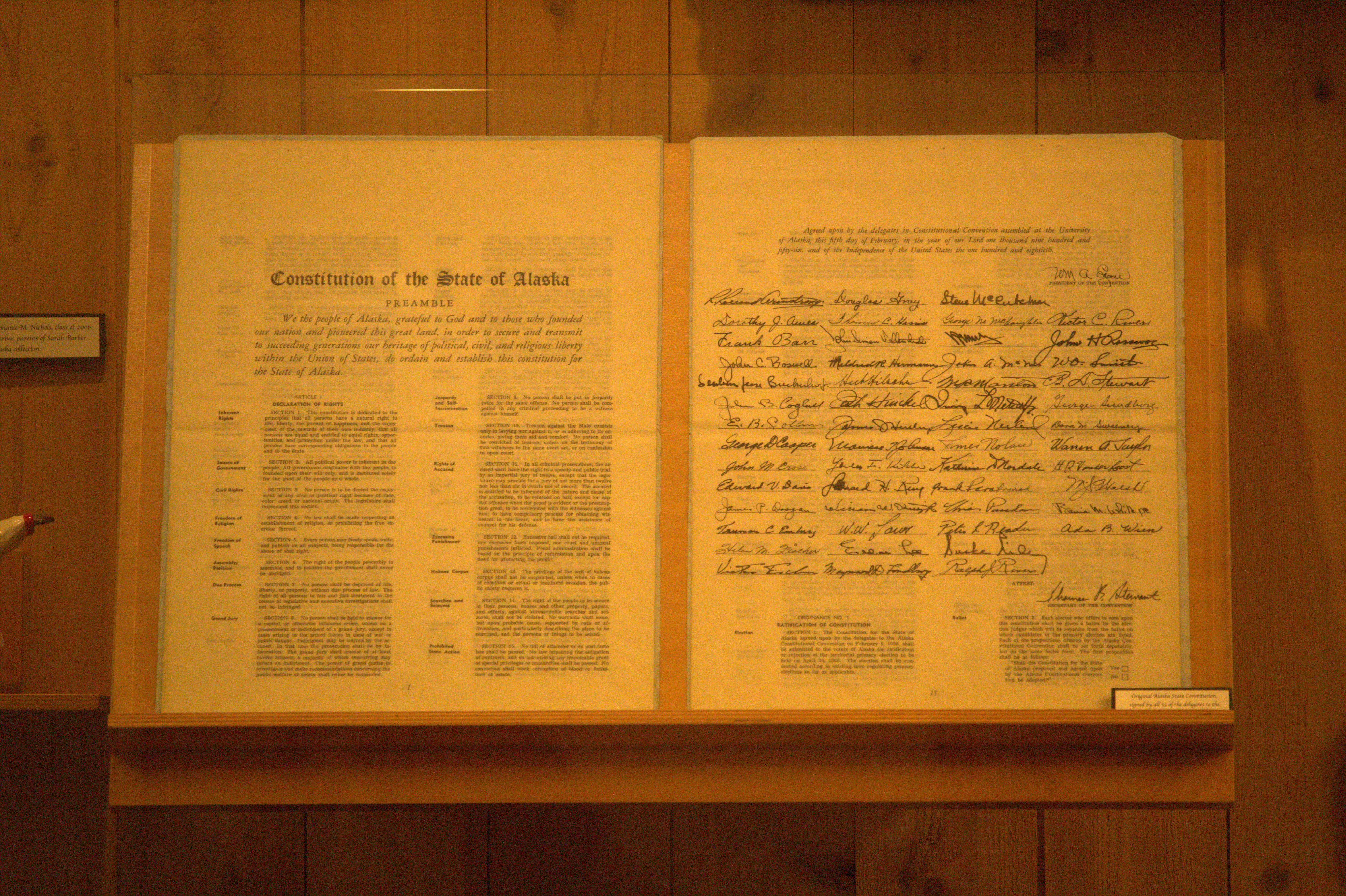 Image of the Alaska State Constitution on display.
