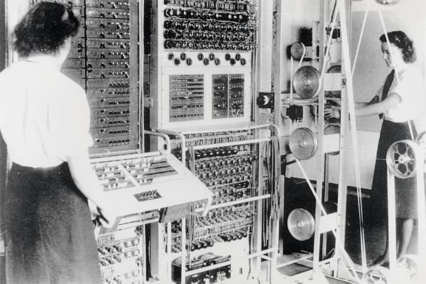 A Colossus Mark 2 codebreaking computer being operated by Dorothy Du Boisson (left) and Elsie Booker (right), 1943.