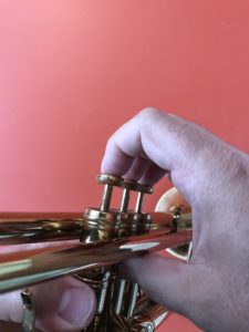 Playing trumpet with finger tips