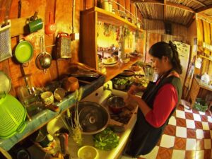 Ana Epule, cooking in her kitchen