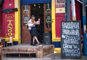 A couple dances in La Boca district
