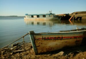 A river with a river boat on it, named Rio Uruguay