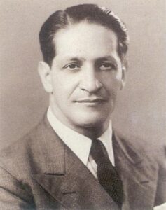 A black-and-white portrait photo of Jorge Eliécer Gaitán