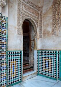 Entrance with colorful mosaic tiles near the steps