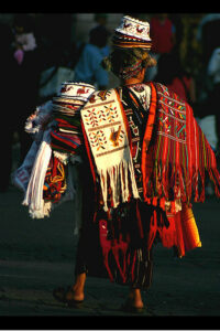 A person selling Guatemalan cloth