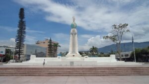 The Monumento al Divino Salvador del Mundo, with a globe and a figure of Christ atop it.