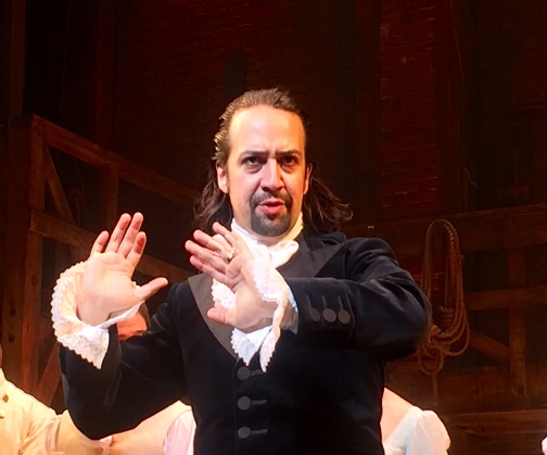 Lin-Manuel Miranda as Alexander Hamilton in the music Hamilton
