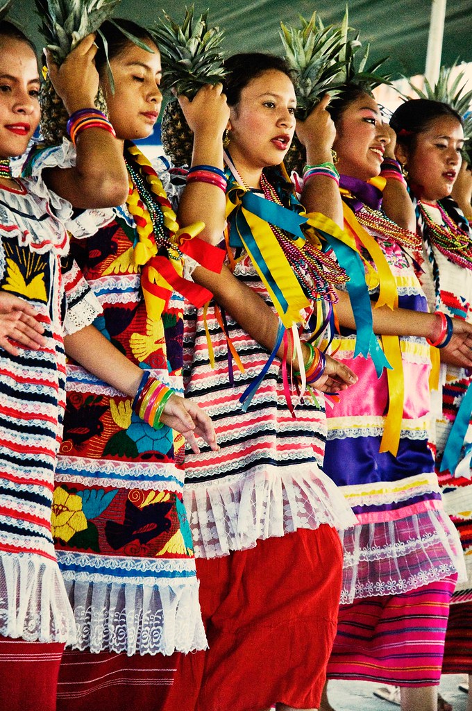 Women dressed in traditional attire for the baile Flor de Piña