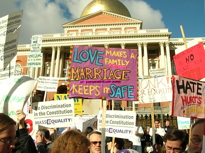 protesters with signs advocating for gay marriage