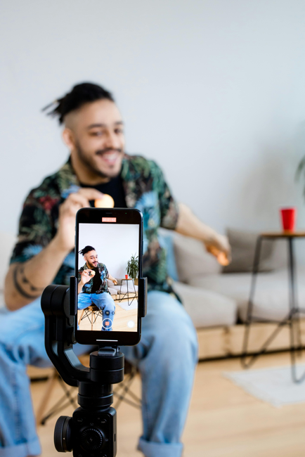 A camera recording a man