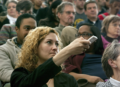 Audience member holds up a clicker
