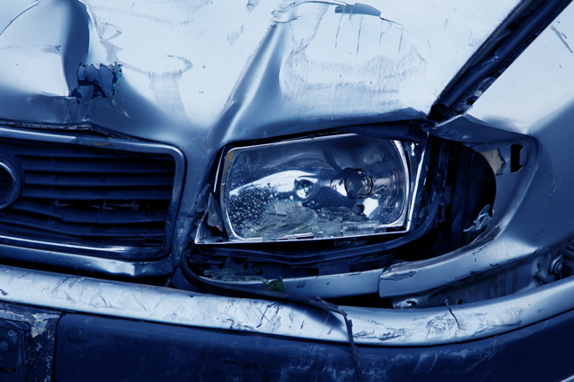 Close up of car front showing damage