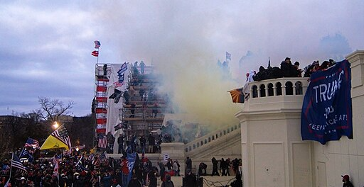 Tear gas and rioters outside the Capitol